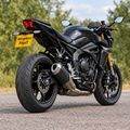 Yamaha MT-10 with WingAero FlipIT motorised number plate bracket, outdoor rear three-quarter view