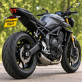 Triumph Street Triple 765 close-up rear three-quarter view with a tidy tail and WingAero FlipIT plate